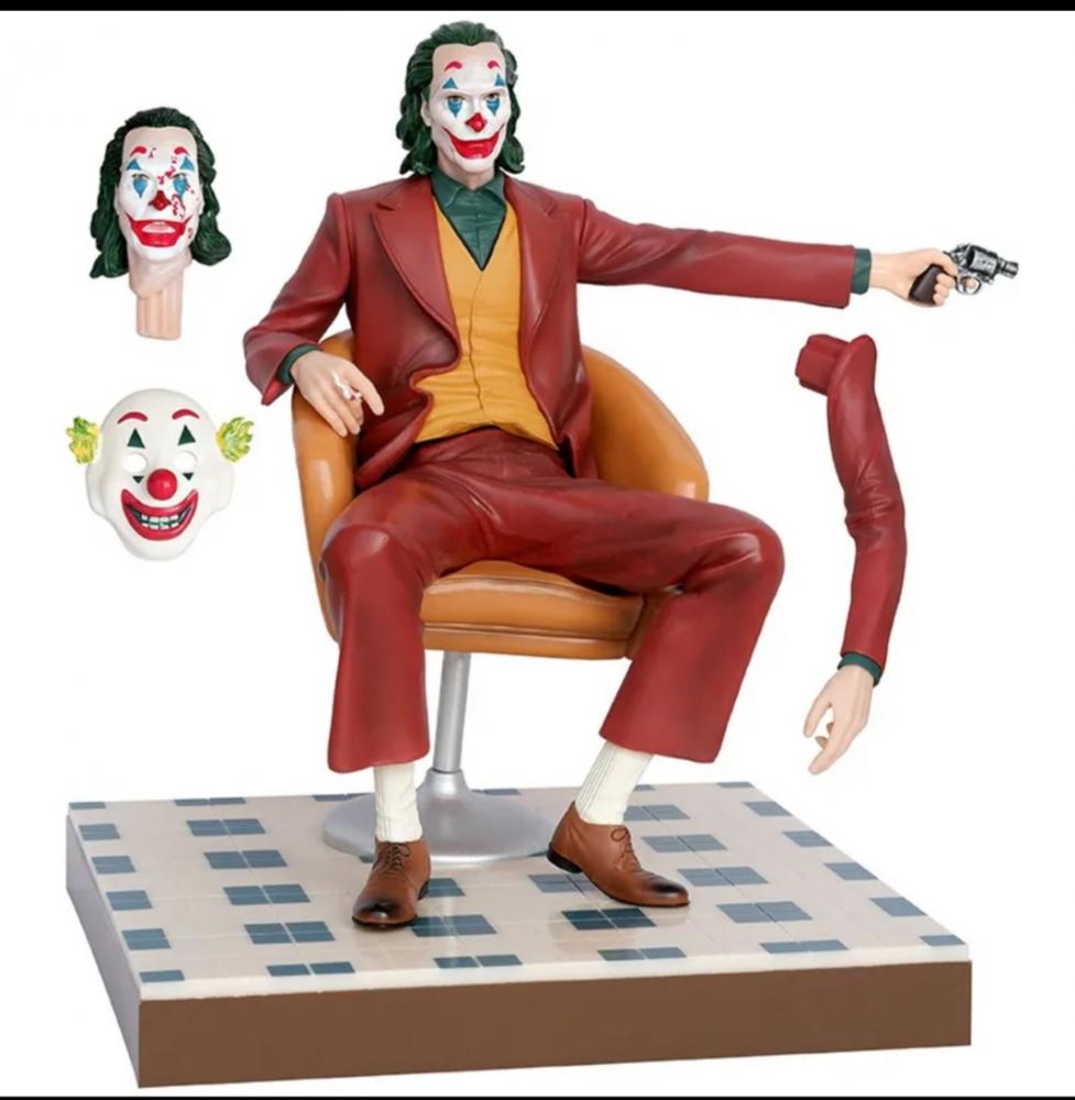 Joker dark knight ..... red clown a great action figure for collectors very high quality
